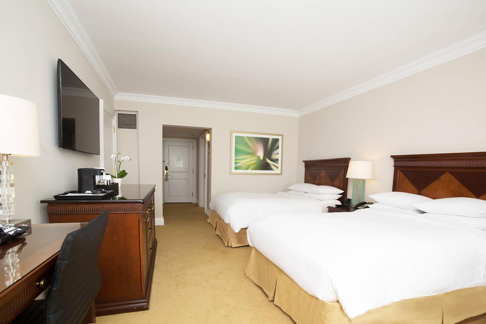 Guest Room with Two Double Beds and City View